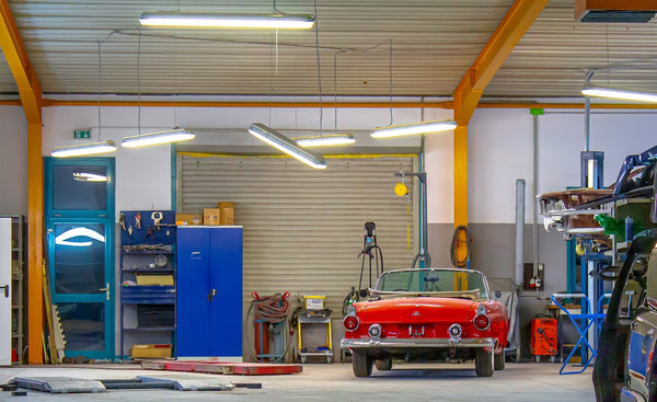 red car in a garage